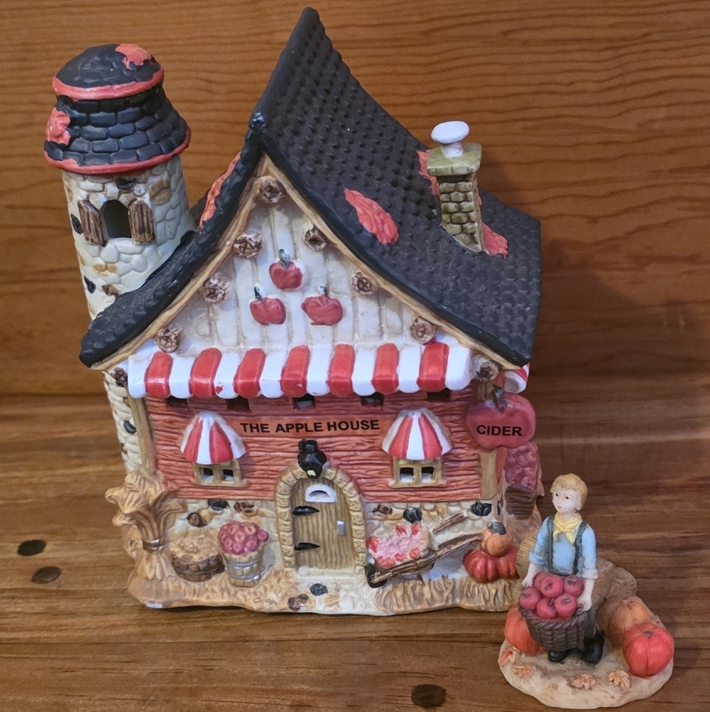 Whimsical Ceramic Apple House with Figure